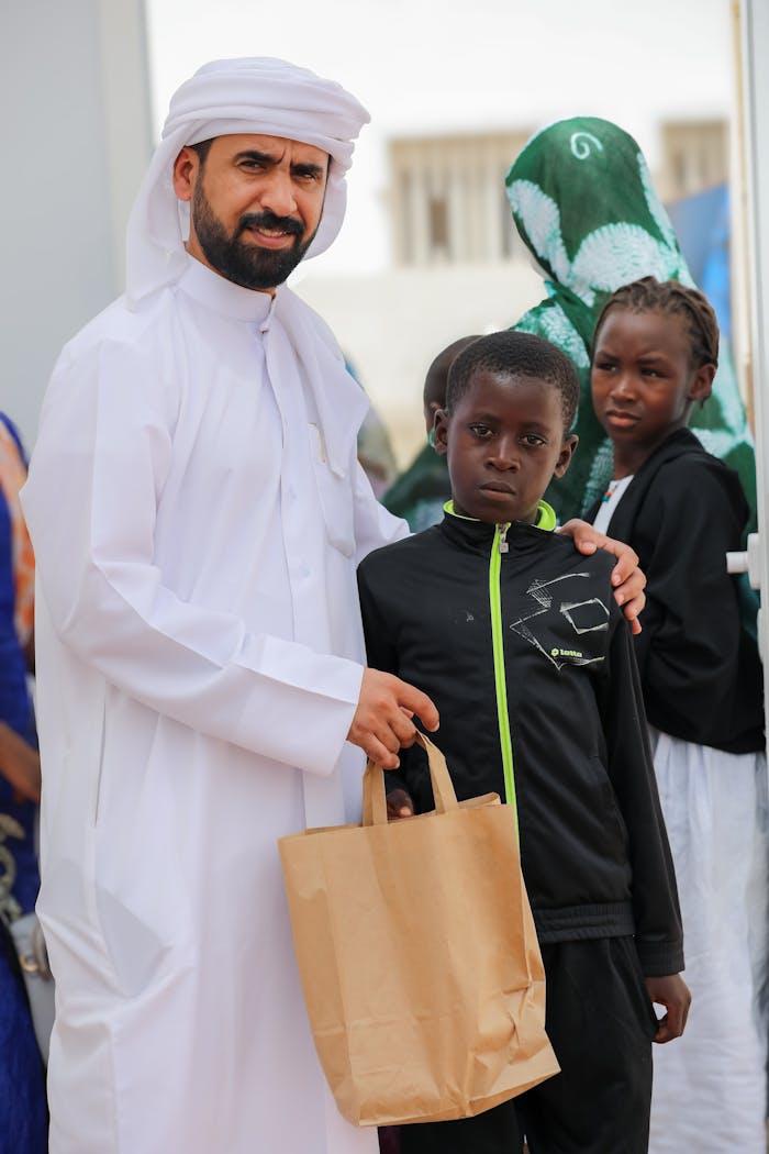 A heartwarming moment capturing a charity event with multicultural attendees, fostering unity.